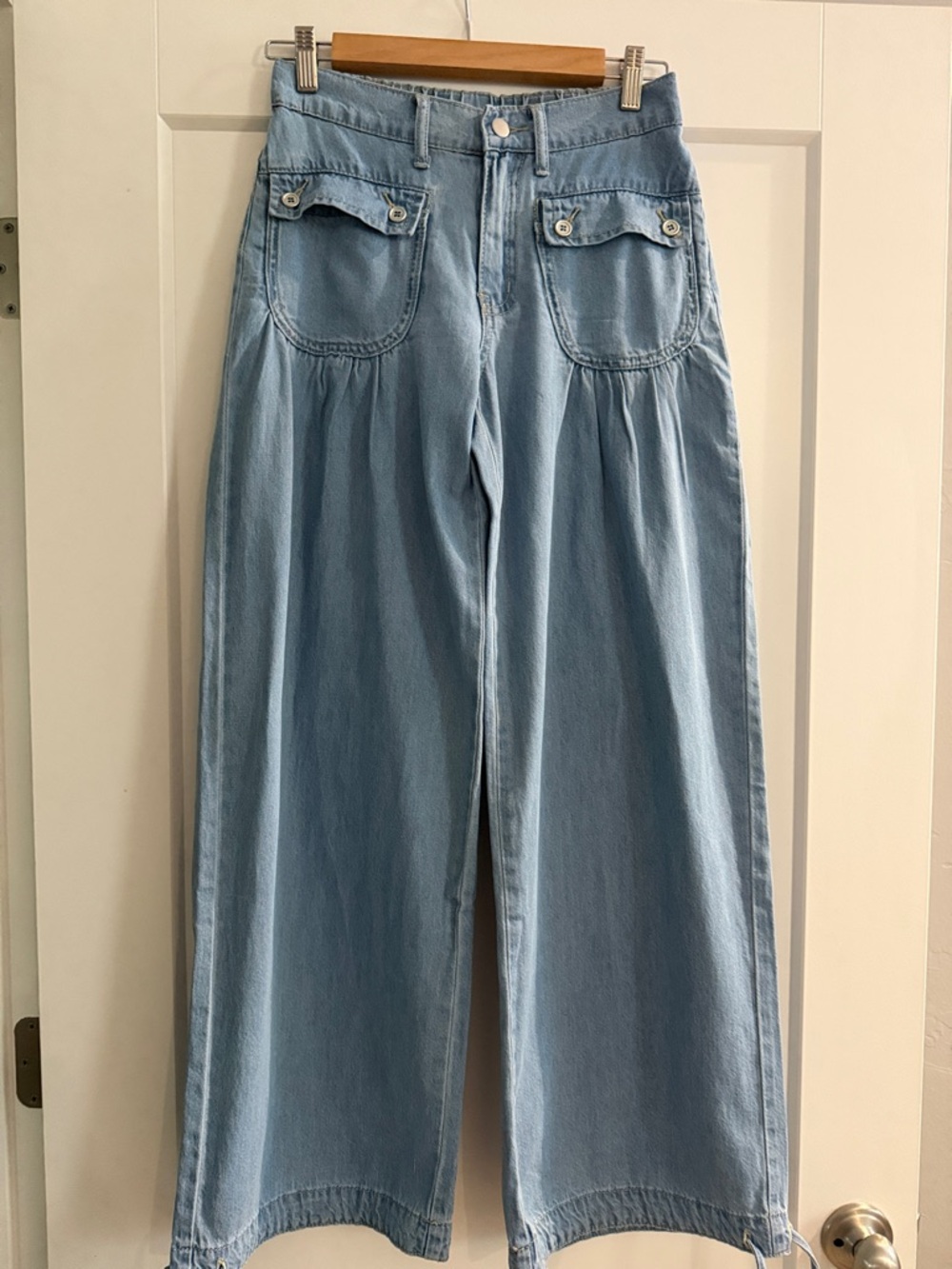 SHEIN Light Blue High-Waist Wide Leg Jeans with Flap Patch Pockets.